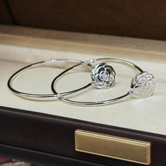 CHANEL Extrait de Camélia earrings