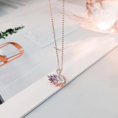 Elegant Purple Swan Pendant with Zirconia