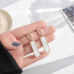 Elegant Gold Frame Dangle Earrings