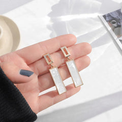 Elegant Gold Frame Dangle Earrings