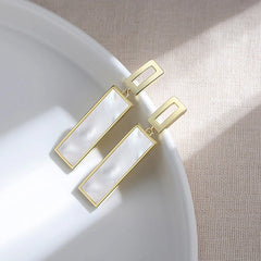 Elegant Gold Frame Dangle Earrings