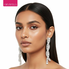 Silver Tone Twisted Baguette Crystal Drop Earrings