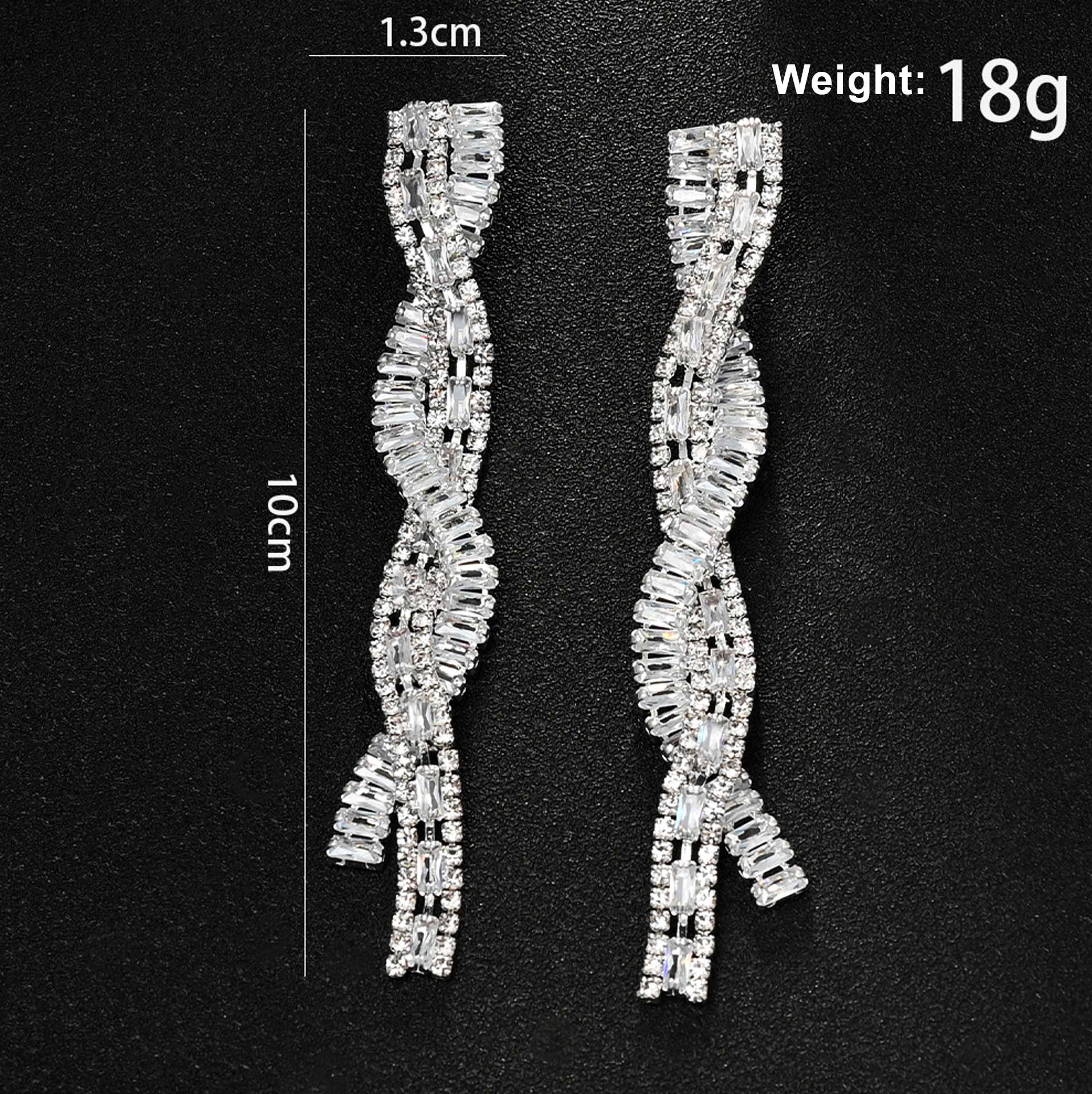 Silver Tone Twisted Baguette Crystal Drop Earrings