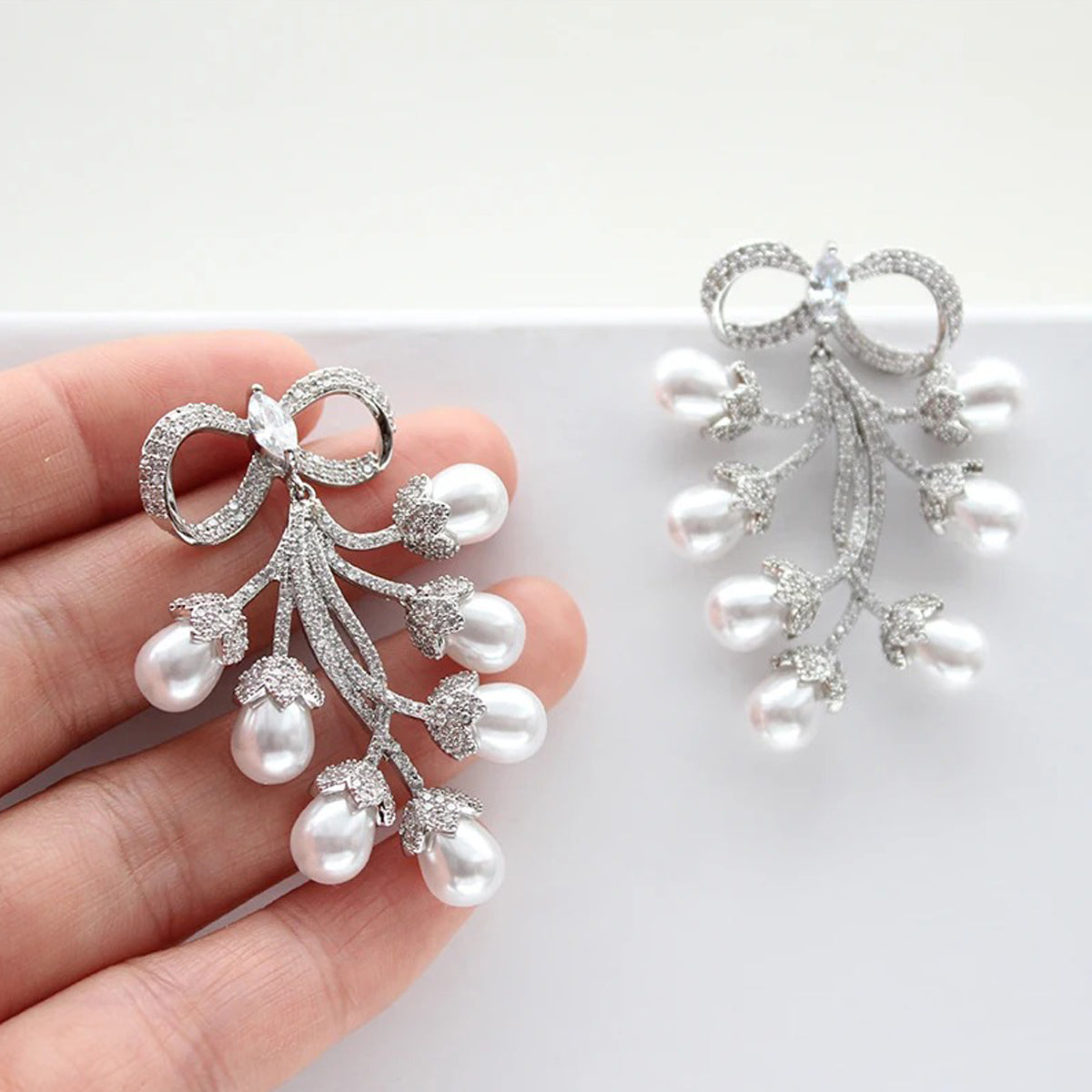 Sparkling Bow & Pearl Drop Earrings - Zircon Embellished Bridal & Wedding Jewelry